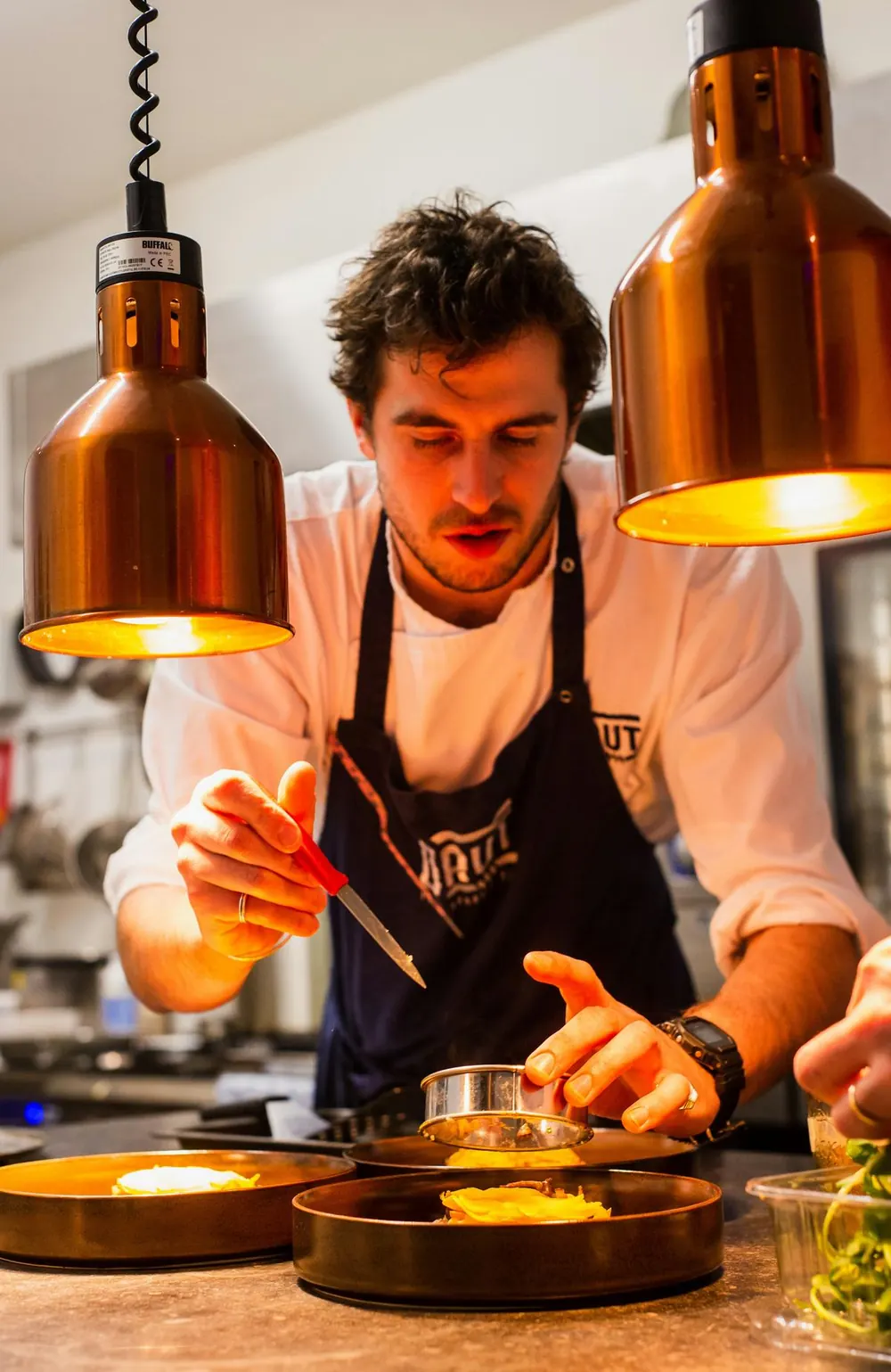 Chef at the wood-fired hearth